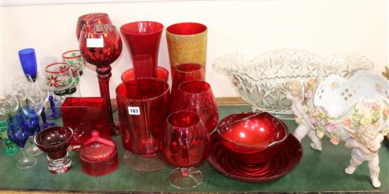 A quantity of ruby and clear glass and a German porcelain centrepiece